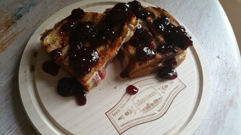 speck and truffle cheese panini with cherry preserves